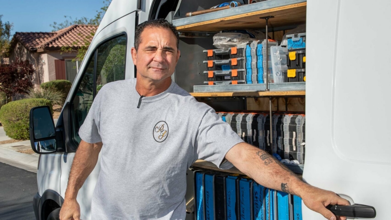 Royalty Plumbing technician opening van