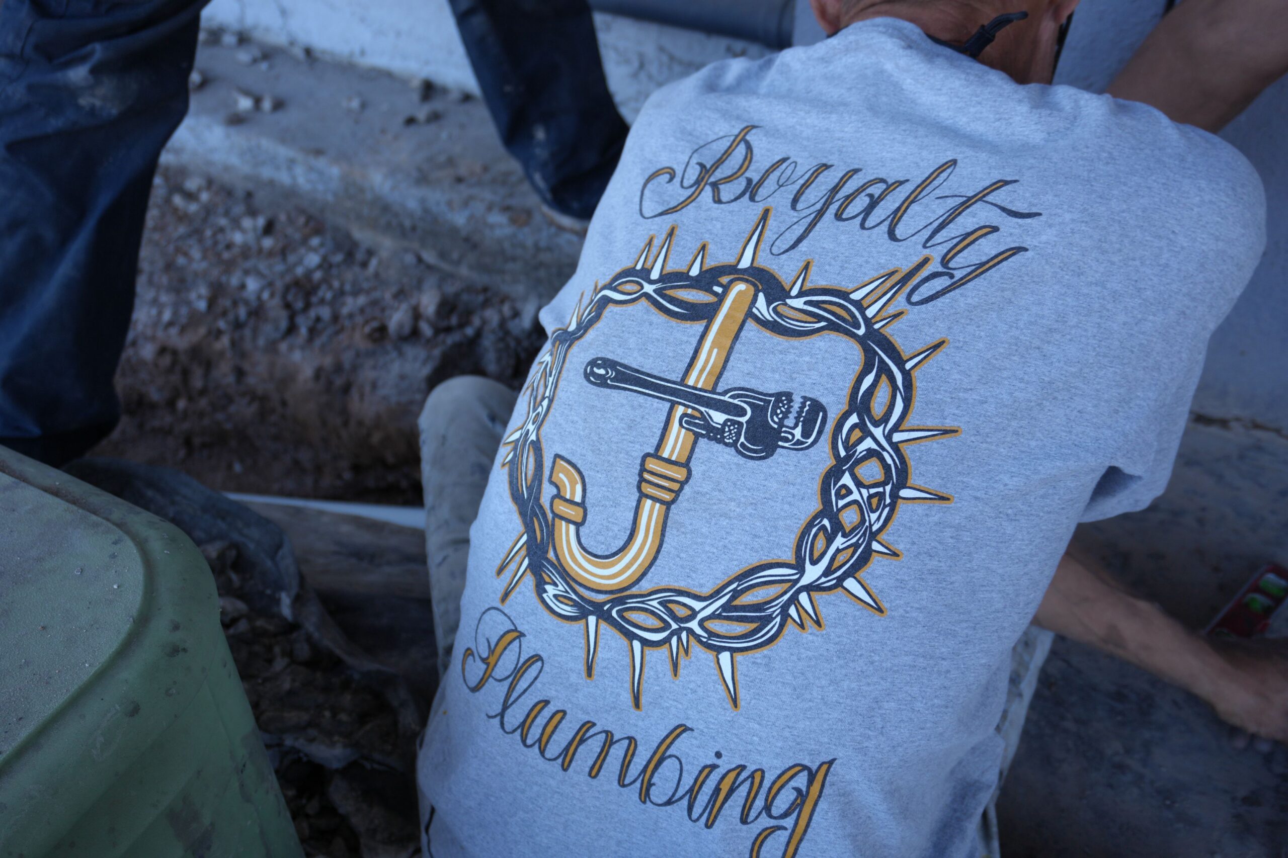 Expert Las Vegas plumber working on a high-fidelity kitchen installation, showcasing premium service quality