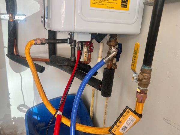 Tankless water heater flush service in Las Vegas home by licensed plumber