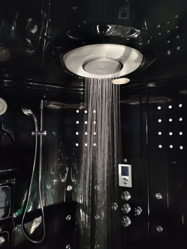 Modern kitchen sink installation with gleaming chrome faucet and premium countertop
