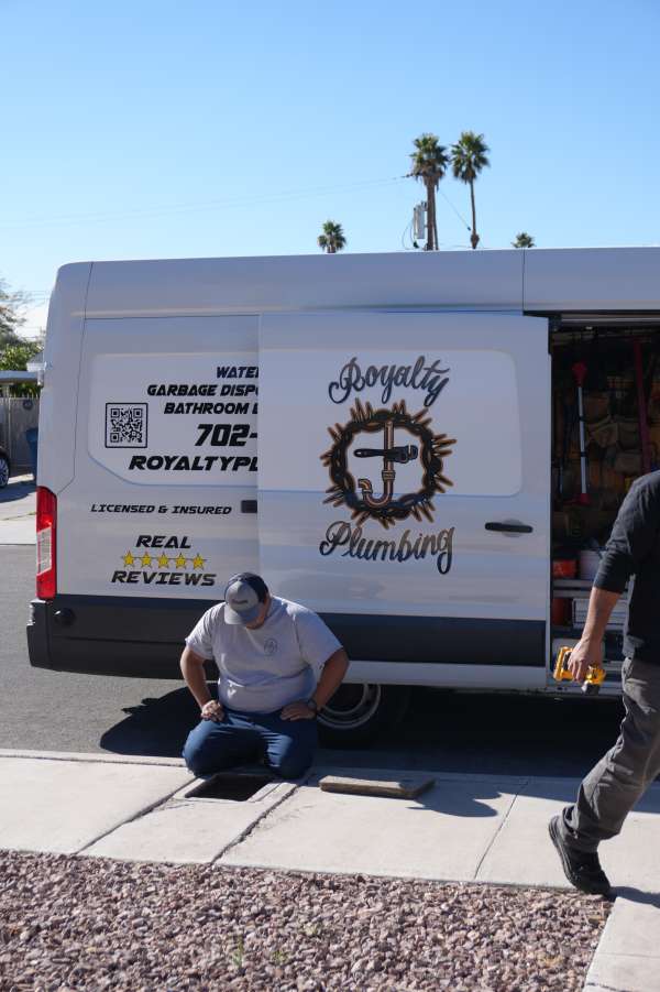 Licensed plumber installing a whole-house water softener loop and tank water heater system in Sun City Summerlin, NV