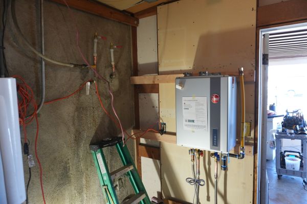 Royalty Plumbing technician performing water heater repair in Las Vegas
