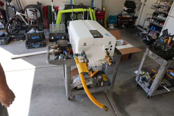 Tankless water heater repair technician diagnostics
