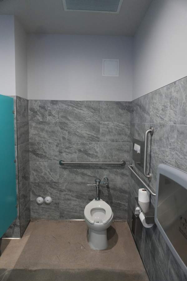 Royalty Plumbing plumber checking toilet flange condition before installation in Las Vegas