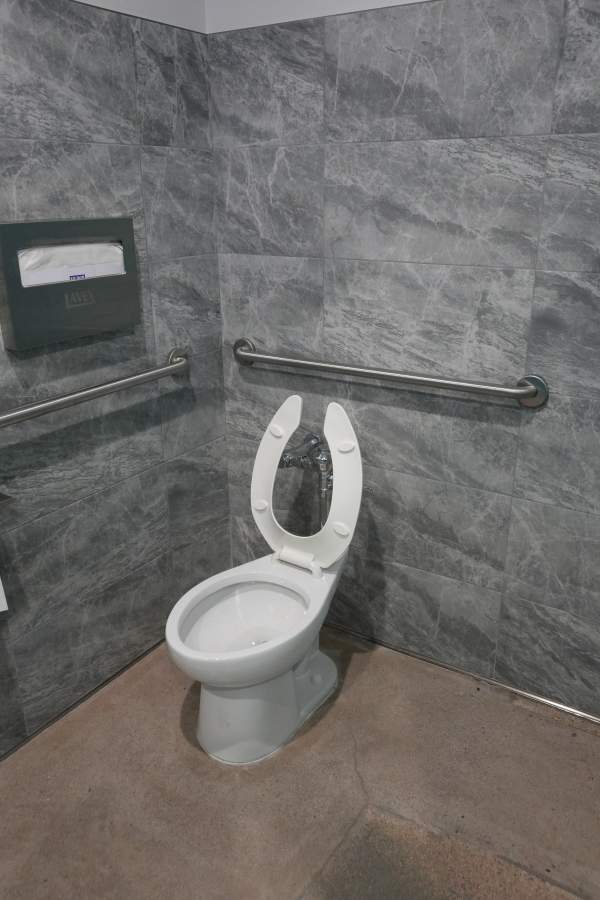 New comfort height toilet installed in Las Vegas bathroom by Royalty Plumbing