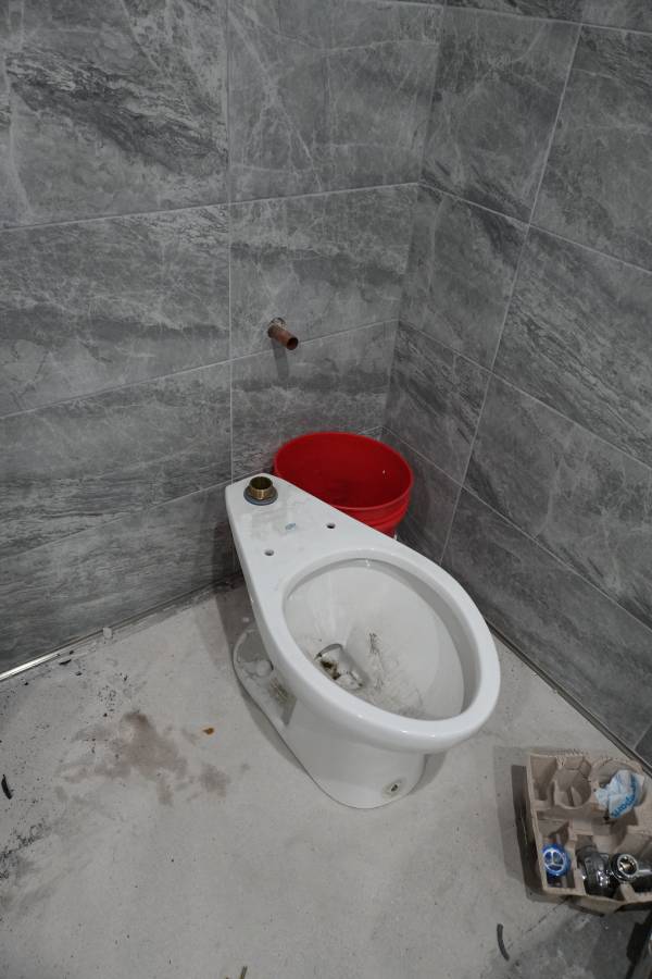 Mineral scale buildup on toilet flapper seat from Las Vegas hard water
