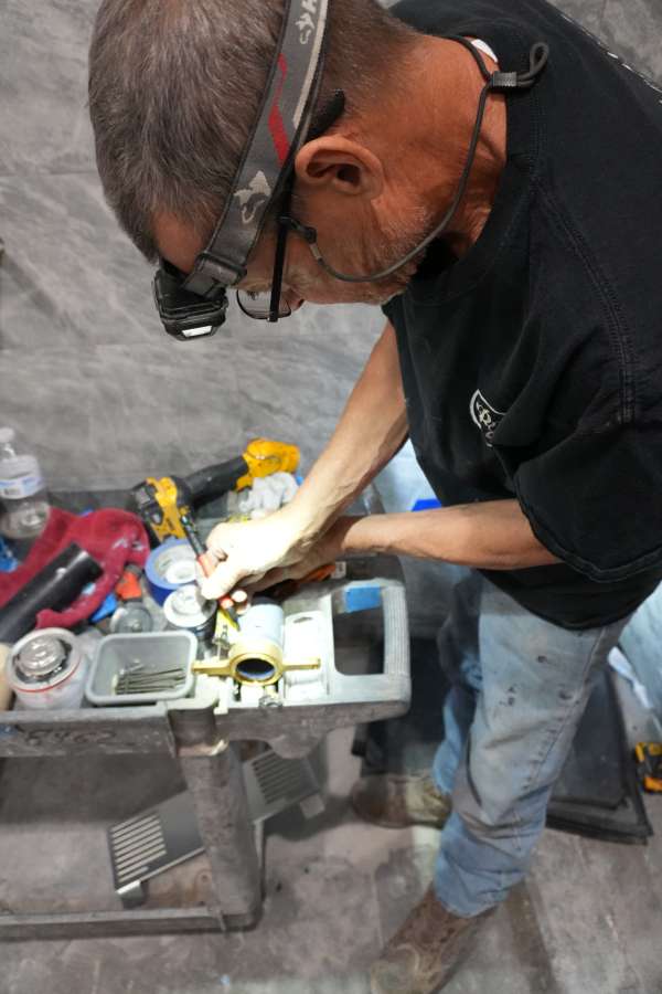 New InSinkErator garbage disposal installed under Las Vegas kitchen sink by Royalty Plumbing