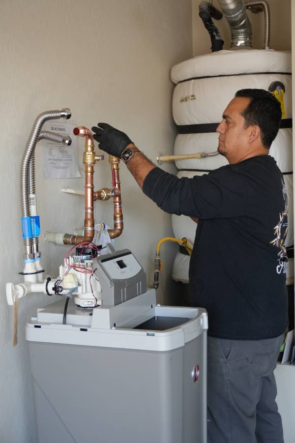 Mineral scale buildup inside garbage disposal grinding chamber from Las Vegas hard water